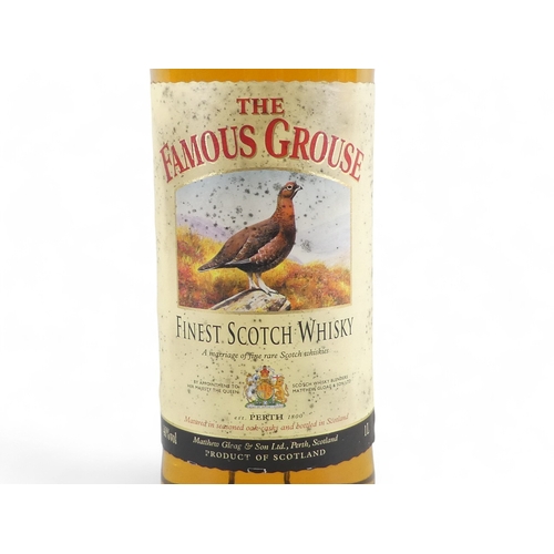 187 - Famous Grouse - two 1 litre bottles.