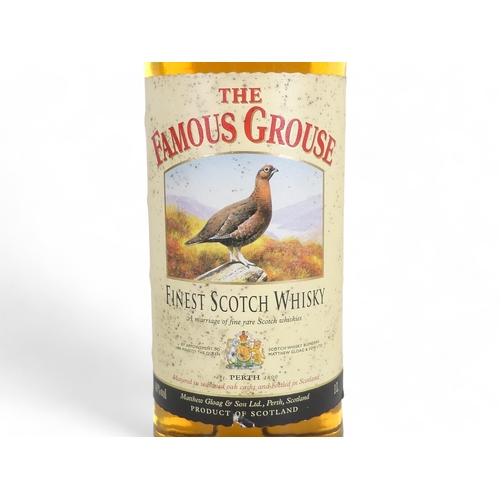 188 - Famous Grouse - two 1 litre bottles.