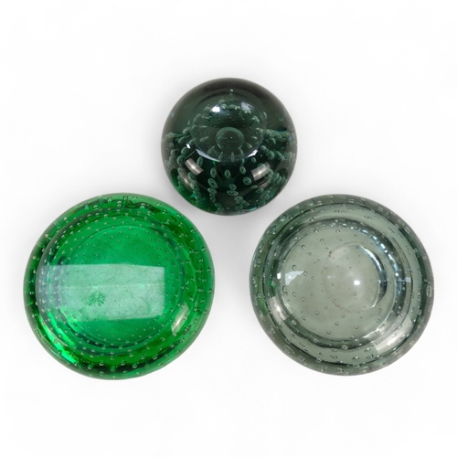 19 - A 20th century green bubble glass paperweight - in the manner of Whitefriars, 8cm diameter, together... 