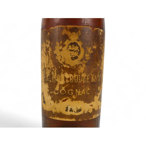 190 - A bottle of cognac - mid 20th century, label indistinct with unbroken capsule, mid shoulder.