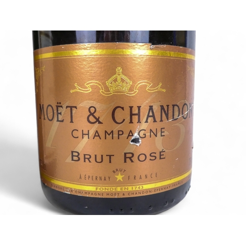 193 - A bottle of Moet & Chandon Brut Rose champagne - together with a bottle of Billecart-Salmon Brut Res... 