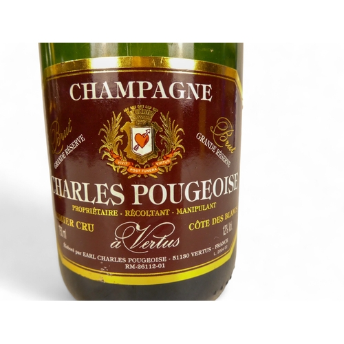 194 - Two and a half bottles of Charles Pougeoise champagne.