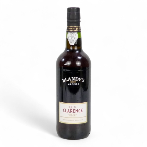 200A - A bottle of Blandy's Duke of Clarence Madeira - together with a bottle of Cossarts 10 year old Speci... 