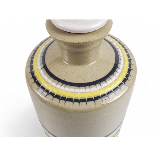 202 - A Hornsea Pottery lamp base - of cylindrical bottle form with dragged hooped slipware decoration, st... 