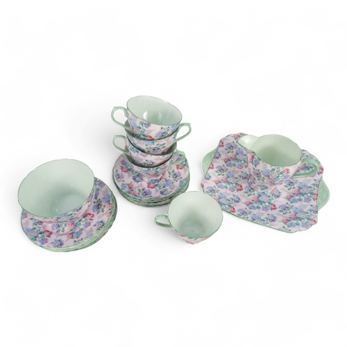 207 - A Shelley 'chintz' Summer Glory part tea service - comprising six place settings including cups, sau... 