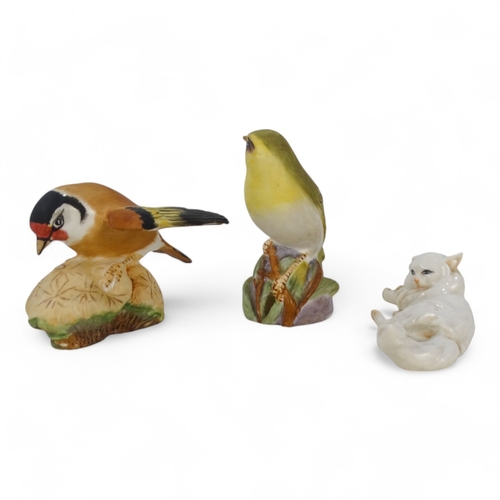 209 - A Royal Worcester model of a Goldfinch - alighting on a thistle with wings outstretched, 8cm wide, t... 