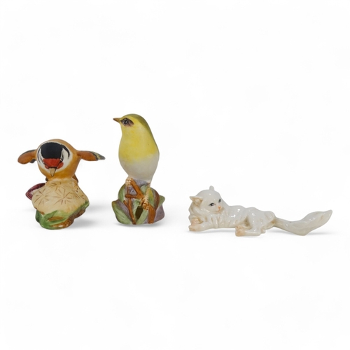 209 - A Royal Worcester model of a Goldfinch - alighting on a thistle with wings outstretched, 8cm wide, t... 