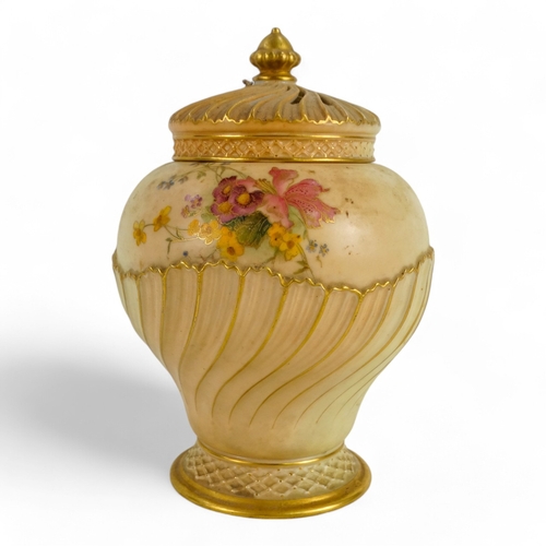 216 - A Royal Worcester potpourri - of part fluted squat baluster form, decorated with flowers on an ivory... 