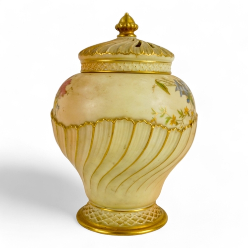 216 - A Royal Worcester potpourri - of part fluted squat baluster form, decorated with flowers on an ivory... 