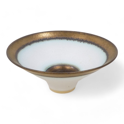 223 - Peter WILLS (British b. 1955) studio pottery bowl - copper lustre rim and well on a cream ground, im... 