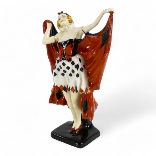 224 - A Royal Doulton 'Butterfly' figure, 'HN720' - modelled as a lady wearing a butterfly bodice and whit... 