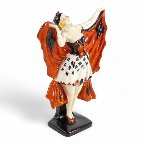 224 - A Royal Doulton 'Butterfly' figure, 'HN720' - modelled as a lady wearing a butterfly bodice and whit... 