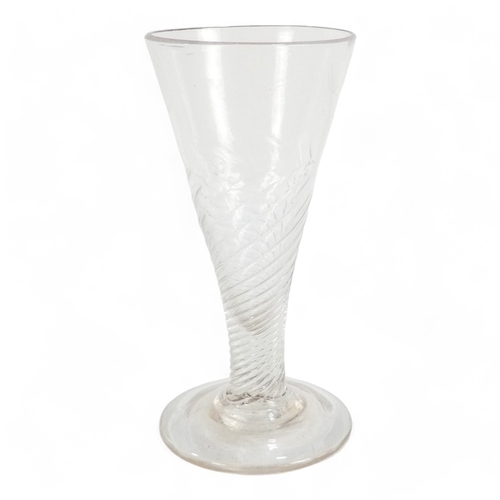 230 - A pair of spiral twist ale glasses - clear glass of tapering form with foot rims, 12cm high, togethe... 