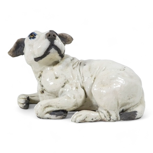 237 - Keza Rudge (British 20th/21st Century) - a spaniel picking up a scent, with raku glaze, signed to un... 