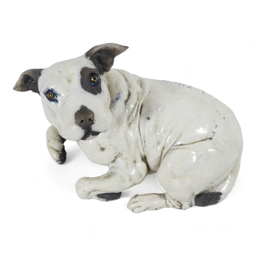 237 - Keza Rudge (British 20th/21st Century) - a spaniel picking up a scent, with raku glaze, signed to un... 