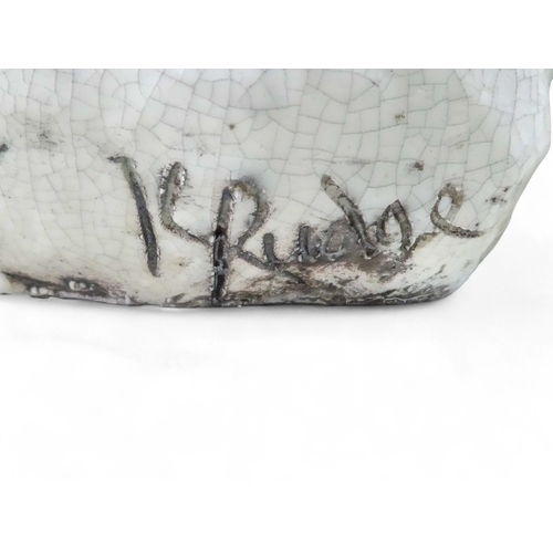 237 - Keza Rudge (British 20th/21st Century) - a spaniel picking up a scent, with raku glaze, signed to un... 