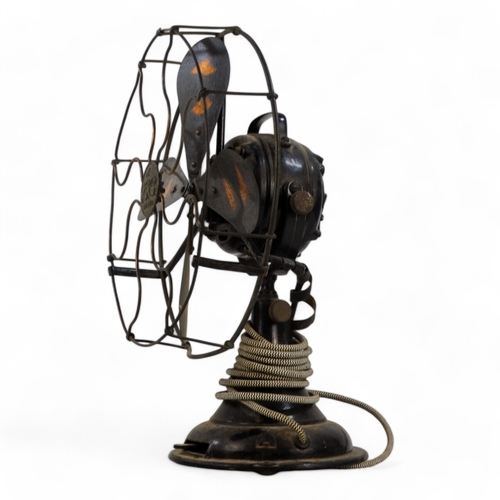 24 - A vintage electric desk fan, GEC, with bronzed blades and black finished body, 50cm high.