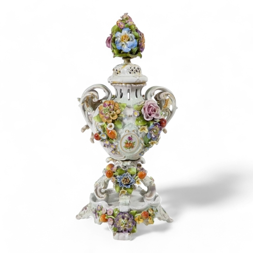 240 - A pair of Schierholz porcelain twin handled vases - each floral and fruit encrusted including a pier... 