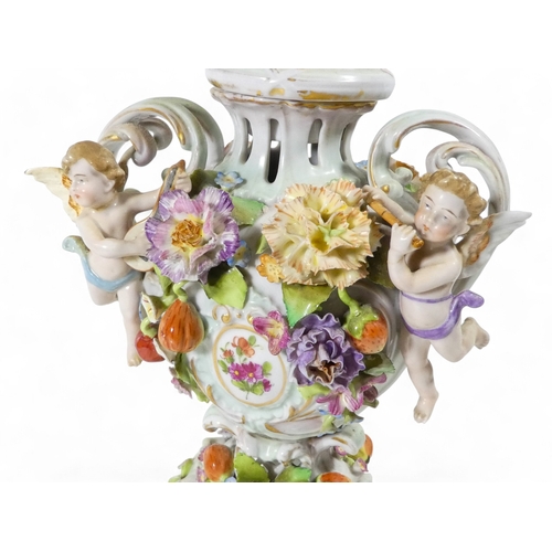 240 - A pair of Schierholz porcelain twin handled vases - each floral and fruit encrusted including a pier... 