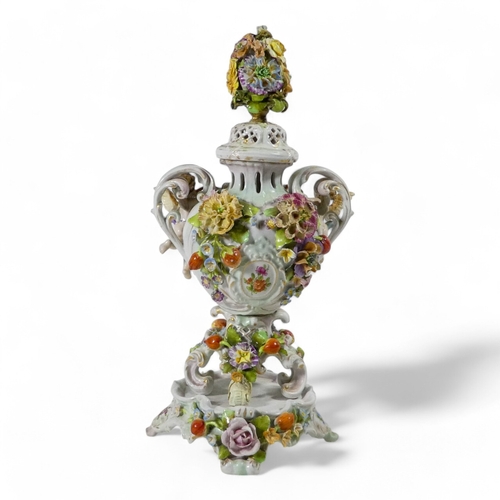 240 - A pair of Schierholz porcelain twin handled vases - each floral and fruit encrusted including a pier... 