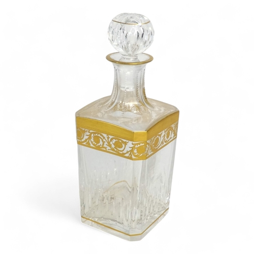 251 - A St Louis glass magnum decanter - square with canted corners with a gilt foliate band, 29cm high.