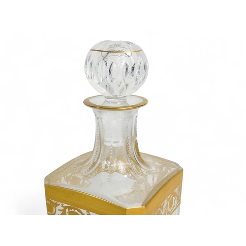 251 - A St Louis glass magnum decanter - square with canted corners with a gilt foliate band, 29cm high.