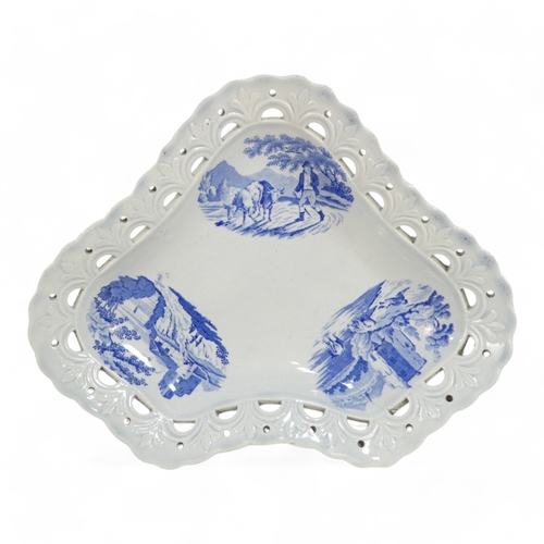 255 - A pair of early 19th century blue and white dishes - of triform with a pierced moulded gallery, deco... 