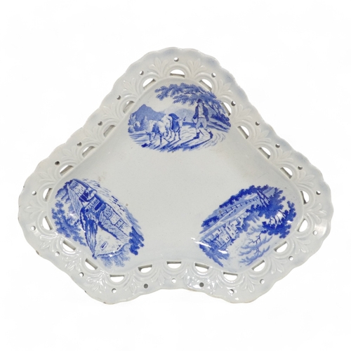 255 - A pair of early 19th century blue and white dishes - of triform with a pierced moulded gallery, deco... 