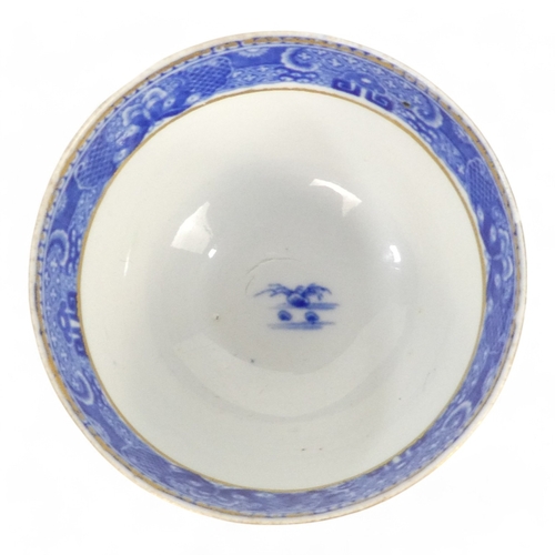 261 - An early 19th century English blue and white tea bowl - chinoiserie decoration, two figures on a bri... 