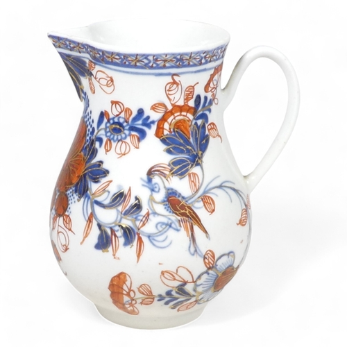 271 - A mid 19th century Liverpool sparrow beak jug - decorated in blue and red with a bird on a branch, h... 