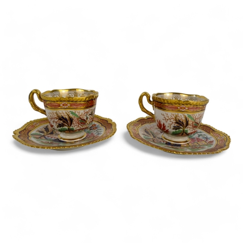 274 - A pair of Worcester Flight Barr & Barr tea cups with saucers - decorated in the Imari style with pag... 