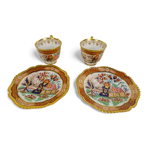 274 - A pair of Worcester Flight Barr & Barr tea cups with saucers - decorated in the Imari style with pag... 