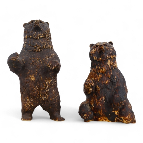 276 - A pair of 20th century German bisque bears -  with a matte brown finish, one seated upright and the ... 