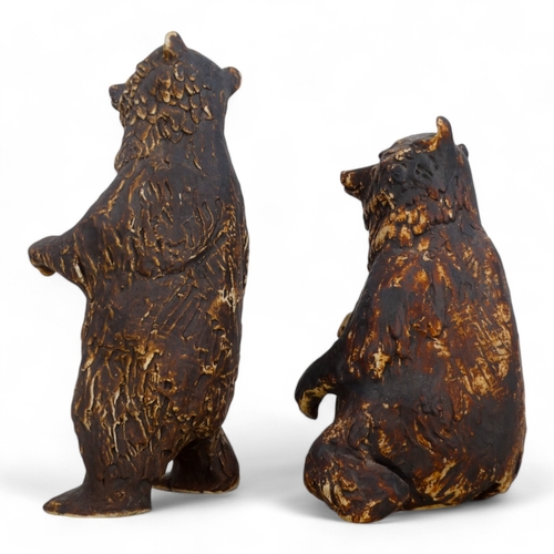 276 - A pair of 20th century German bisque bears -  with a matte brown finish, one seated upright and the ... 