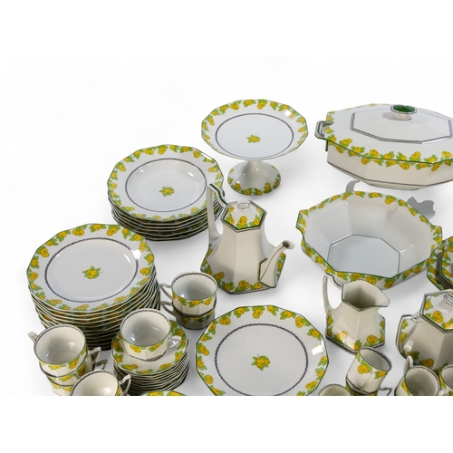 281 - A 20th century Limoges dinner service - decorated with lemons and leaves on a white ground, includin... 