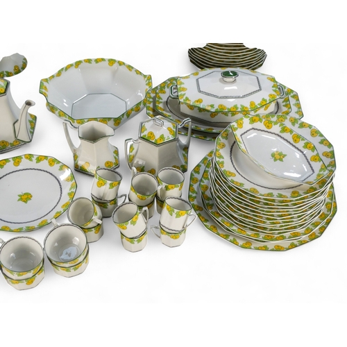 281 - A 20th century Limoges dinner service - decorated with lemons and leaves on a white ground, includin... 