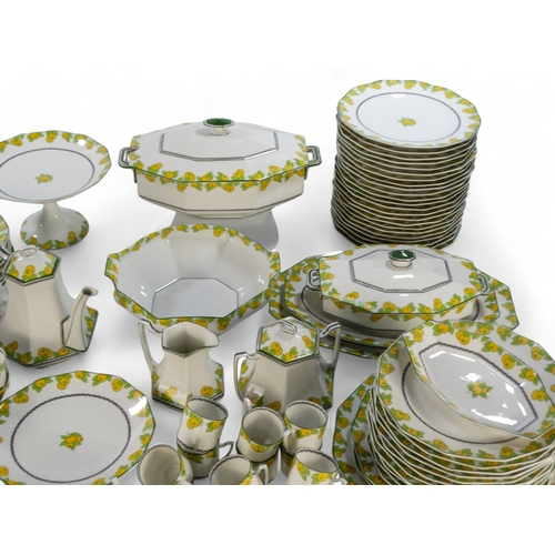 281 - A 20th century Limoges dinner service - decorated with lemons and leaves on a white ground, includin... 