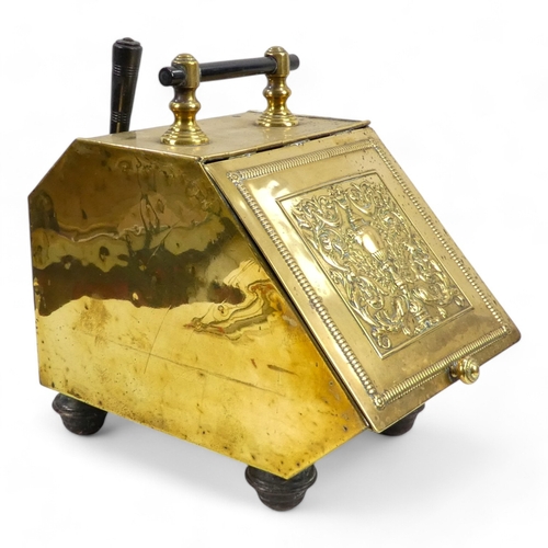 3 - An early 20th century brass coal scuttle - with sloping hinged cover, turned ebonised handle and a s... 