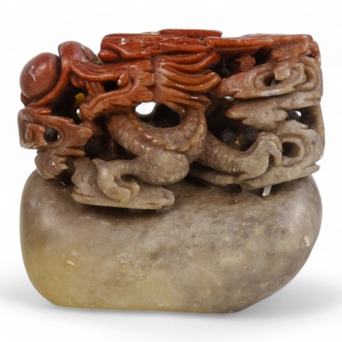 315A - A Chinese carved soapstone figure of a dragon - chasing the flaming pearl, 6cm high, together with a... 