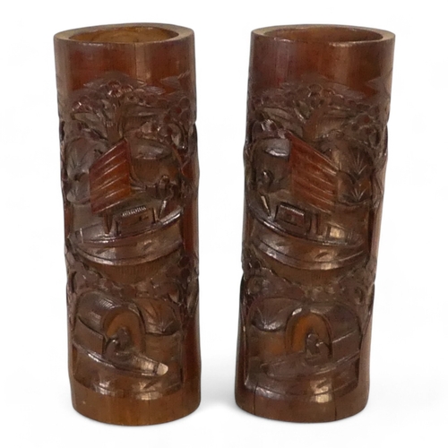 321 - A pair of 20th century Chinese bamboo brush pots - carved with boats and foliage, 33cm high. (2)