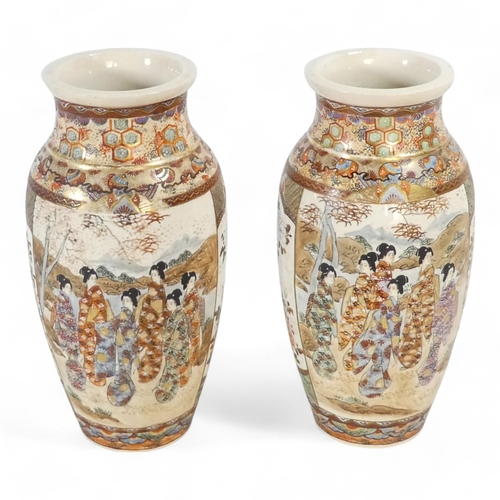 322 - A pair of late 19th century Satsuma vases - decorated in panels showing elegant ladies in a landscap... 