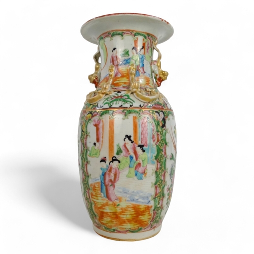 328 - A late 19th century Cantonese vase - decorated with panels of flowers and figures in an interior, mo... 