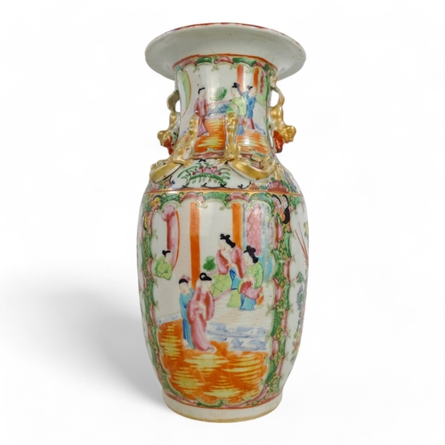 328 - A late 19th century Cantonese vase - decorated with panels of flowers and figures in an interior, mo... 