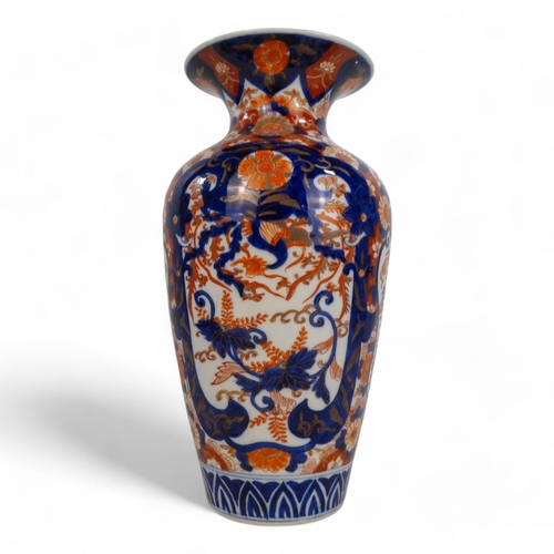 329 - A late 19th/ early 20th century Imari vase - of baluster form and decorated with foliage in a typica... 