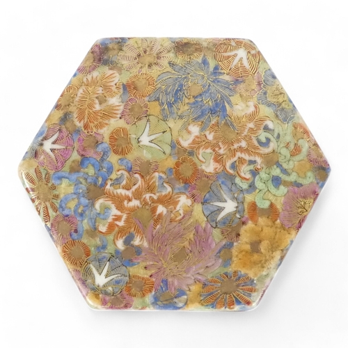 337 - An early 19th century Japanese Satsuma box - hexagonal with a millefleur decoration, 11cm wide.