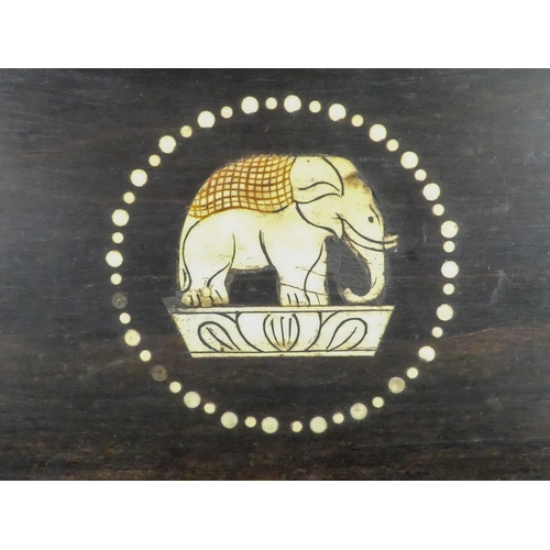 35 - A late 19th century Anglo Indian box - of rectangular form, leaf carved and elephant inlay to interi... 