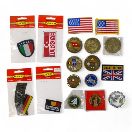 364 - A quantity of medallions - together with cloth badges and other memorabilia.