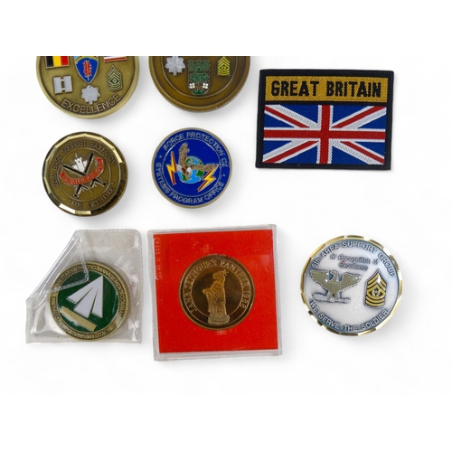 364 - A quantity of medallions - together with cloth badges and other memorabilia.