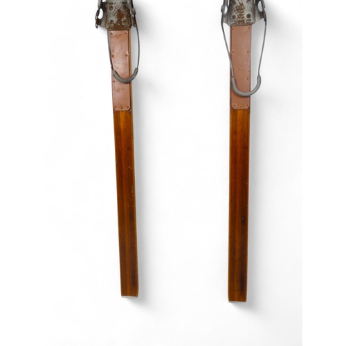 37 - A pair of vintage wooden skis by Bonna - with Telemark bindings, 206cm long.