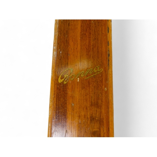 37 - A pair of vintage wooden skis by Bonna - with Telemark bindings, 206cm long.